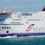 Ship near English channel cliffs