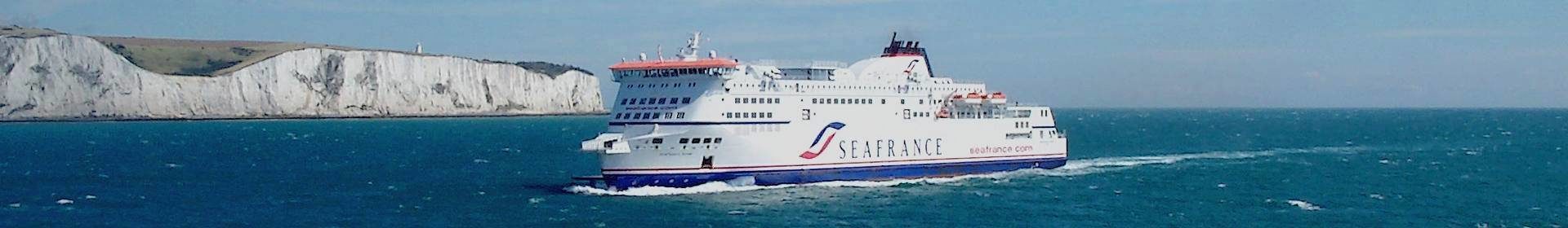 Ship near English channel cliffs