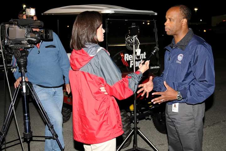 Journalist interviewing on camera