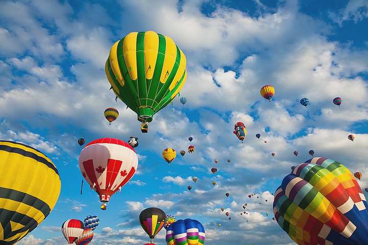 Manned balloons heading into the sky